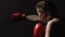 Female boxer doing air punching training, Muay Thai combat sport, martial arts