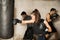 Female boxer training in a gym