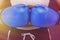 Female boxing girl in blue boxing gloves