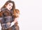 Female brown fur coat. Fur store model enjoy warm in soft fluffy coat with collar. Fur fashion concept. Winter elite