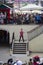 Female busker, singing opera at Covent Garden, London.