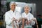 Female butchers processing sausages