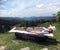 Female camino pilgrim in rusty old bathtub near Pamplona