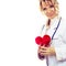 Female cardiologist with red heart.