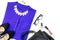 Female casual office style clothing and accessories -purple shirt, heeled shoes, handbag, make up items.