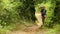 Female caucasian tourist trekking walking at himalayan mountains, Nepal