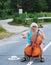 Female cellist performing.