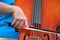 Female cellist performing.