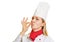 Female chef cook giving sign of best taste with hand