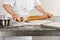 Female Chef Rolling Dough