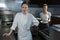 Female chefs holding food plates