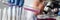 Female chemist holds test tube of glass in hand closeup