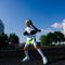 Female child boxer in gloves, feminism concept. Back to school, physical training lesson