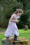 Female child in dress and cowboy boots