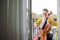 Female classical musician playing cello at home.