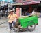 Female cleaner using cell phone