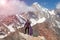 Female Climber Holding Ice Axe and Alpine Rope