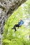 Female climber, woman climbing rock.