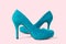 Female closeup women shoes isolated on pink background, copy space. Fashion and shopping concept. High heels woman fashionable
