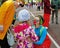 Female clown entertains the child at festival `Clownfest` in the park Sokolniki in Moscow