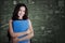 Female college student smiling in the class