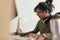 Female computer programmer working at her desk