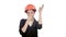 Female construction worker in helmet making funny dancing on white background