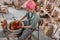 Female crafter making clay dishes in pottery room