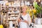 Female customer buying indian souvenir statue