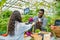 Female customer buying organic food vegetables cabbage in farm market