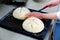 Female cutting dough in a creative manner