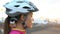 Female Cyclist With Bike Helmet Looking At Sunset - Portrait Of Sporty Woman