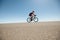 Female cyclist on a country road training for triathlon