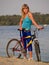 Female cyclist posing outdoors