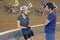 female cyclist at velodrome with coach