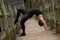 Female Dancer Arching Back on Bridge