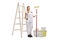 Female decorator with paint roller standing in front of ladder