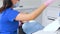 Female dentist with boy patient at dental clinic