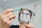 FeMale dentist in special glasses with magnifying glasses and mask. Medical worker.