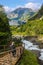 Female descending stairway above beautiful Geirangerfjord