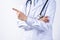 Female doctor body part with hand gesture, young woman physician with stethoscope  on white background, close up, cropped