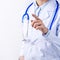 Female doctor body part with hand gesture, young woman physician with stethoscope  on white background, close up, cropped