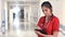 Female doctor in corridor