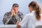 Female Doctor Discussing With Army Soldier Suffering From Ptsd