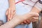 Female doctor examining a patient\'s foot