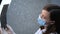 Female doctor examining an x-ray of a patient. Medical staff discuss radiography results