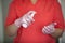 Female doctor in gloves and mask, holds a disinfectant spray.