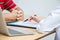 Female doctor hand hold silver pen filling patient history list at clipboard pad, Patient listening receiving in medical clinic