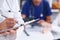 Female doctor hold clipboard pad and fill medical history