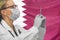 Female doctor. Influenza from coronavirus, prevention of pandemic virus infection. Virus in North Qatar